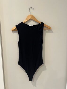 Skin Worldwide Black Sleeveless Twist Strap Bodysuit